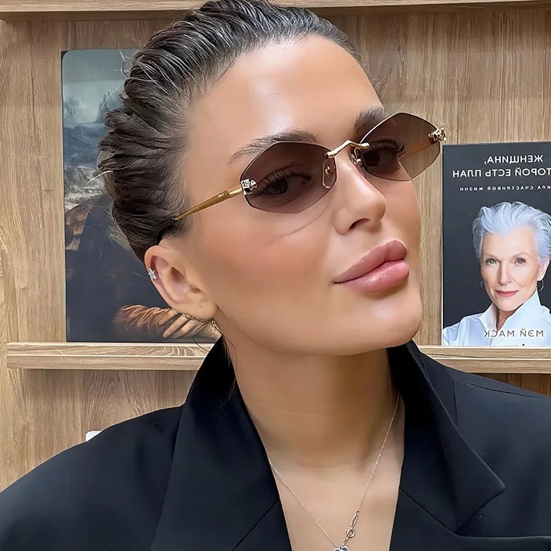 Women’s Rimless Geometric Oval Frame Sunglasses