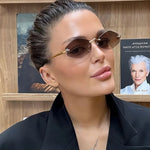 Women’s Rimless Geometric Oval Frame Sunglasses