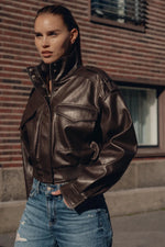 Women’s Zip Front Pocket Cropped Leather Look Jacket